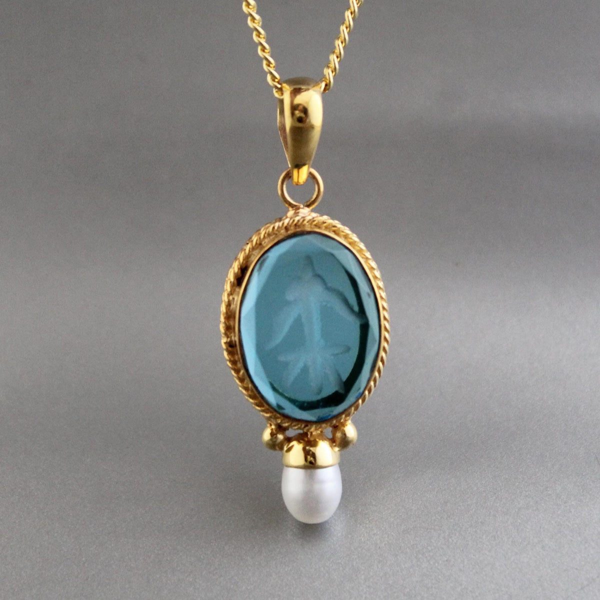 Blue glass intaglio pendant necklace with a pearl
