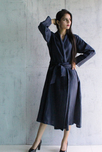 Blue Linen Kimono Wrap Dress: woman in Navy Blue linen kimono wrap dress, hand raised to hair, heels