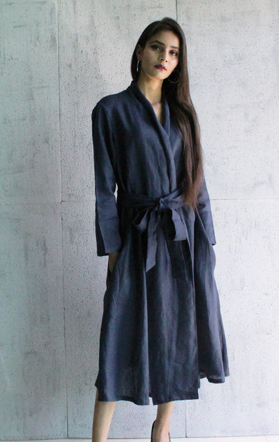Blue Linen Kimono Wrap Dress: woman in Navy Blue linen kimono wrap dress, three quarter view, belt tied