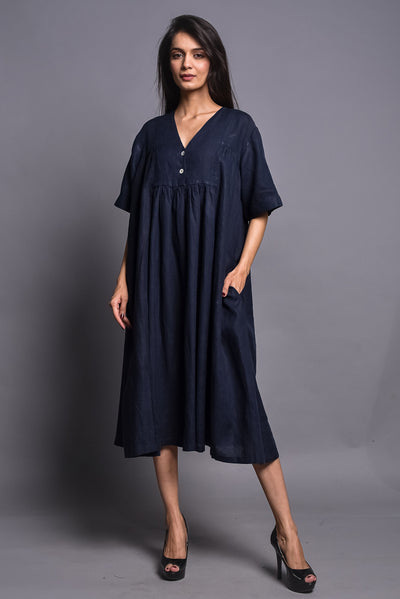 Blue Loose Fit Linen Tunic Dress: woman in Navy Blue tunic dress, arm at side, front view