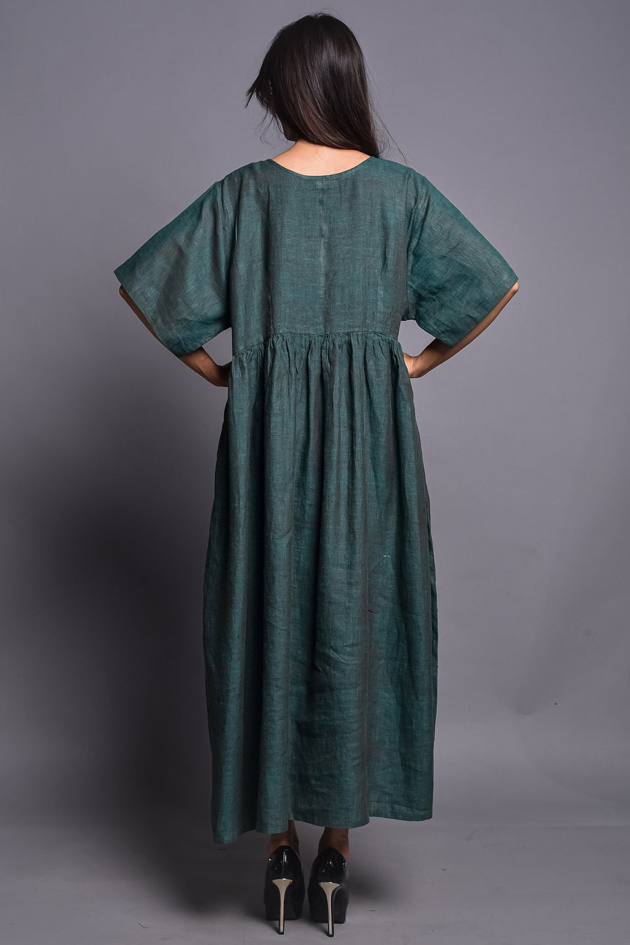 Bohemian Linen Maxi Dress: back view of Deep Green dress with short sleeves