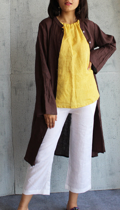 Brown Linen Kimono Jacket: close-up of Brown linen kimono jacket over yellow halter top