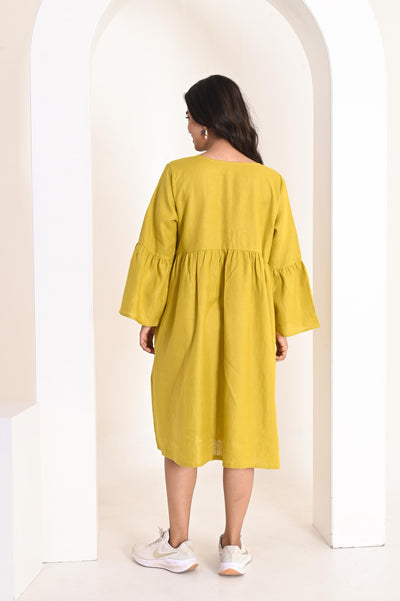 Chartreuse Linen Midi Dress, Bell Sleeve: back view of chartreuse linen midi dress with gathered body