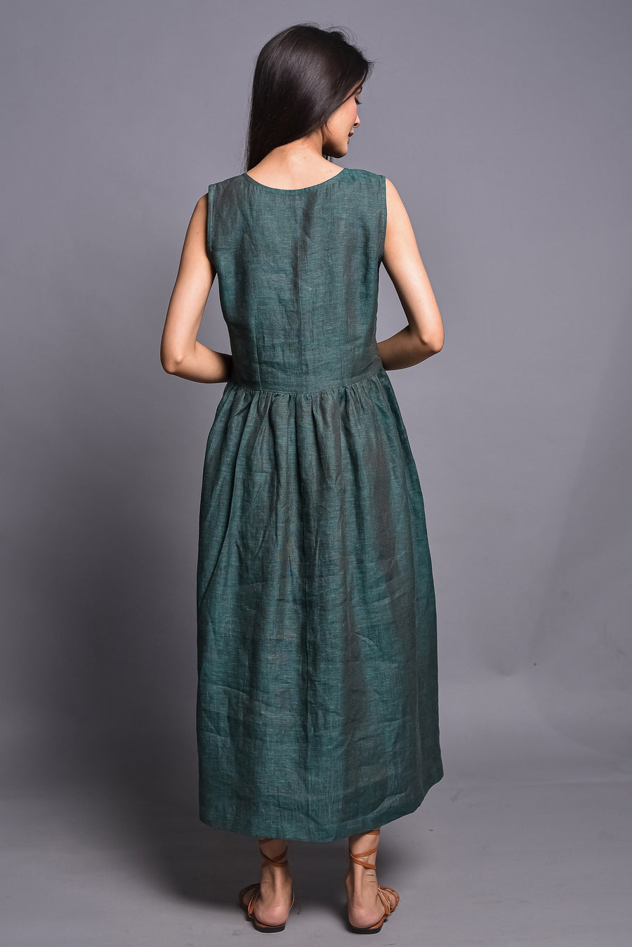 Green Sleeveless Linen Midi Dress: back view of Deep Green sleeveless linen midi dress with gathered waist