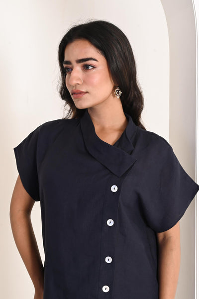 Handmade Linen A-Line Dress, Collared: close-up of woman in Navy Blue linen dress with collar and pearl buttons