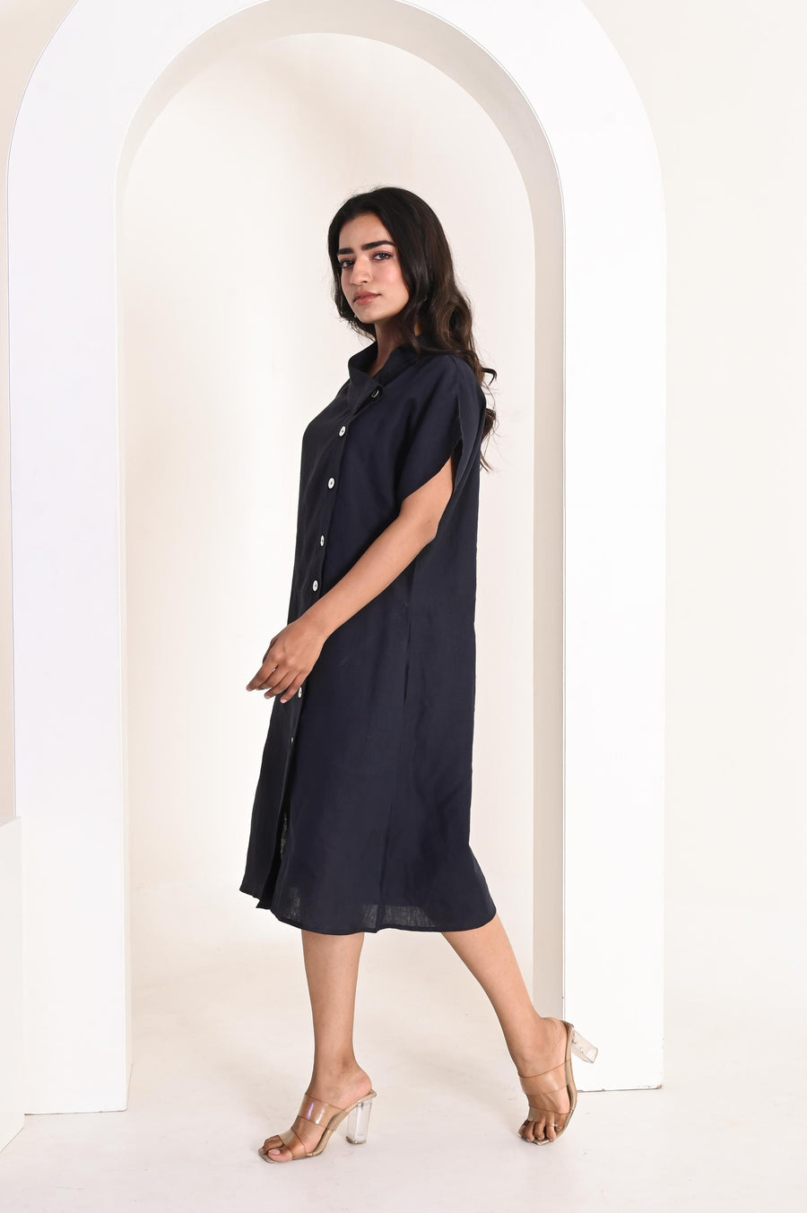 Handmade Linen A-Line Dress, Collared: side view of woman walking in Navy Blue A-line linen dress