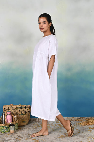 Handmade Linen Midi Dress, Empire Waist: side view of White linen midi dress with short sleeves