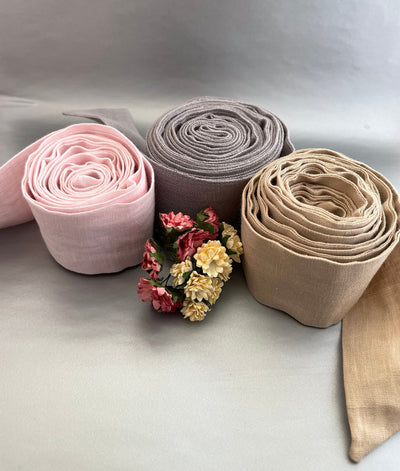 Handmade Washed Linen Belt: rolled linen belts in pink, grey and tan