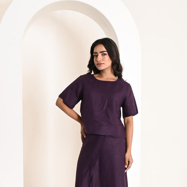 Linen Casual Top, Short Sleeve: woman in Dark Plum short sleeve linen top and skirt, hand on hip