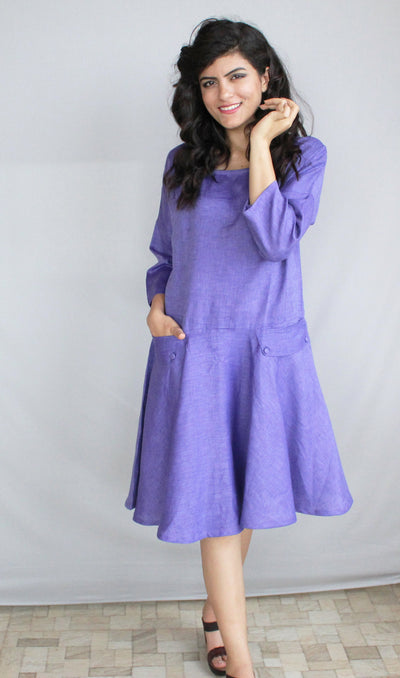 Linen Knee Length Party Dress, Circle Skirt: woman in purple dress, hands at neck, smiling