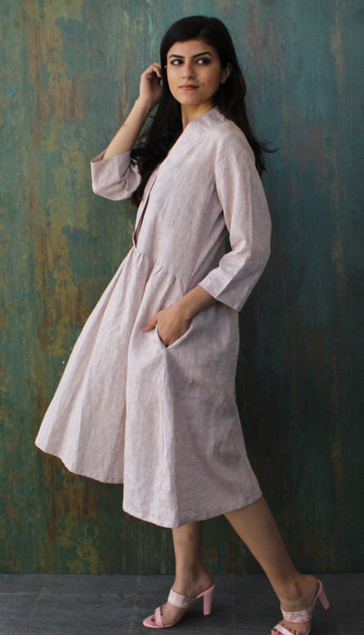Linen Midi Dress, Long Sleeve: side view of Dusty Rose midi dress, hand in pocket