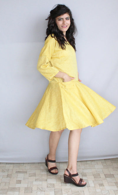 Linen Midi Shift Dress, Pockets: woman in yellow linen dress with flared skirt, hand in pocket, studio