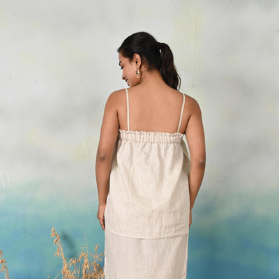 Linen Spaghetti Strap Top, Ruffle Tank: back view of woman in Natural linen strappy top and skirt