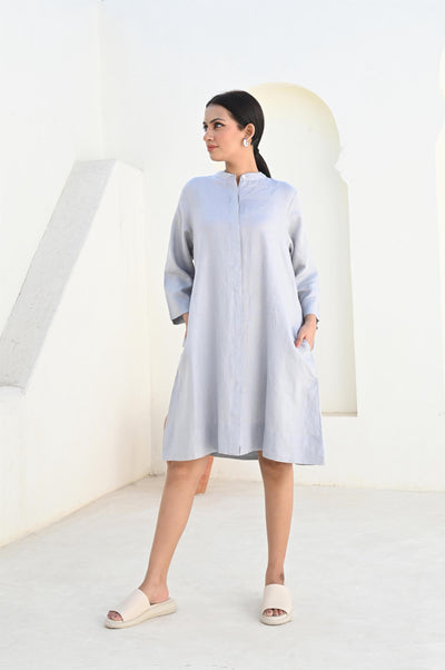 Linen Tunic Dress, Long Sleeve Loose Fit: woman in Light Grey loose linen tunic dress with long sleeves, hands in pockets