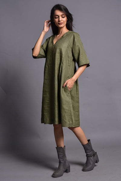 Linen Tunic Dress, V-Neck Half Sleeve: woman in moss green linen tunic dress, hand near face, three quarter view