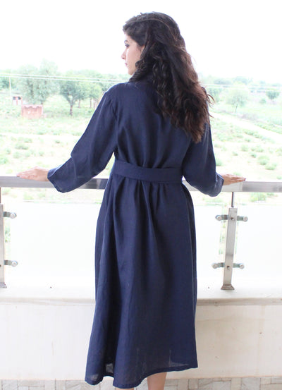 Linen Wrap Dress, Long Sleeve: Navy Blue wrap dress, back view on balcony