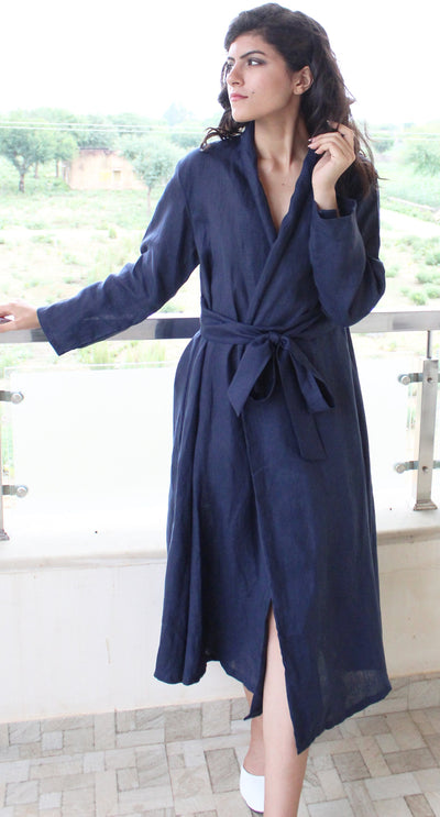 Linen Wrap Dress, Long Sleeve: woman in Navy Blue wrap dress, side view, hand on railing
