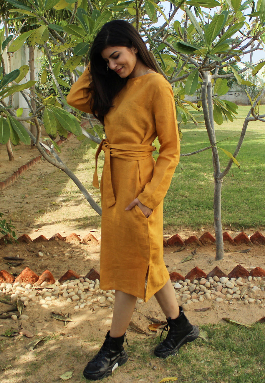 Long Sleeve Belted Linen Midi Dress: woman in Honey midi dress, hand on shoulder