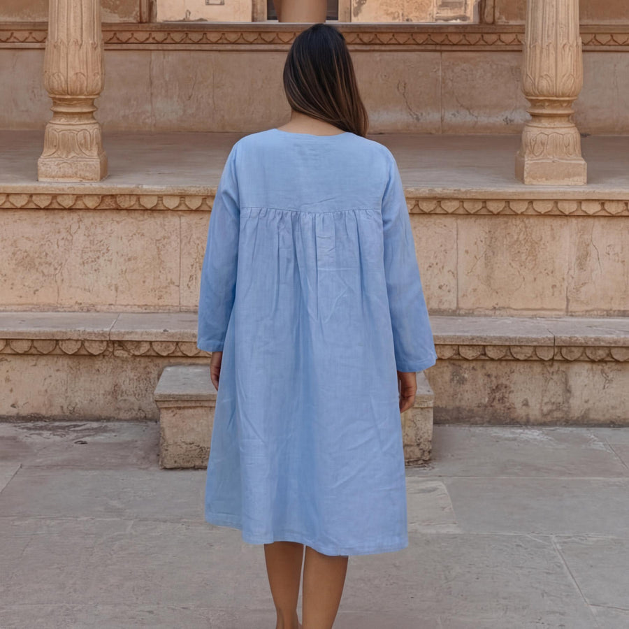 Long Sleeve Linen A-Line Dress: woman in Sky Blue dress, back view with gathers