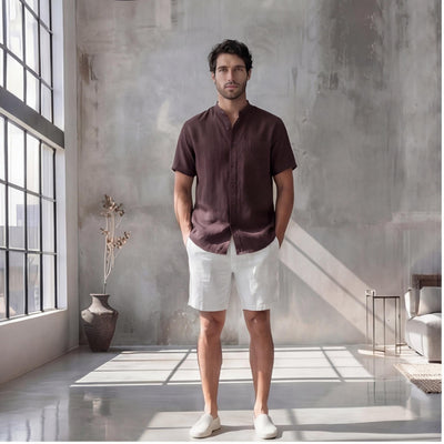 Men's Plus Size Short Sleeve Linen Shirt: man in brown short sleeve linen shirt and white shorts, hands in pockets