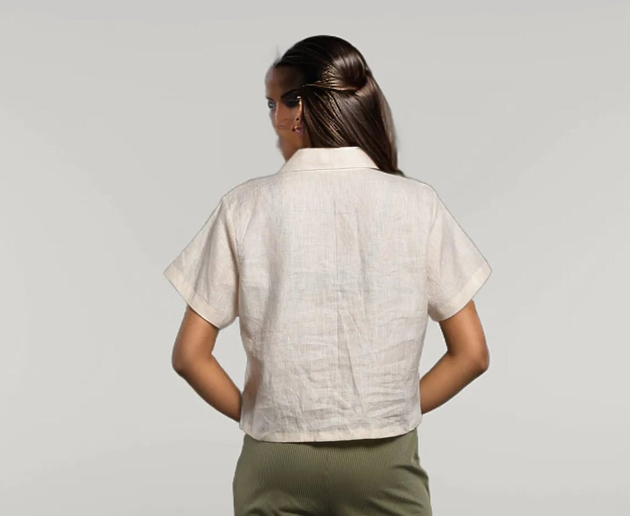 Off White Linen Shirt, Button Up: back view of woman in Off White cropped linen shirt with short sleeves