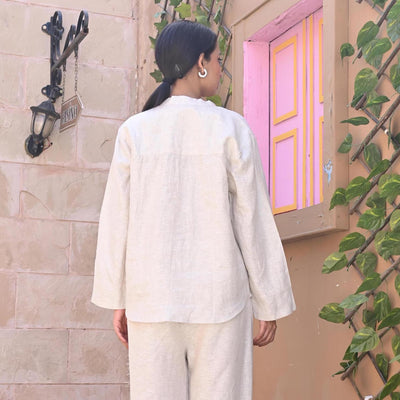 Oversized Linen Collar Shirt, Long Sleeve: back view of woman in Natural oversized linen shirt