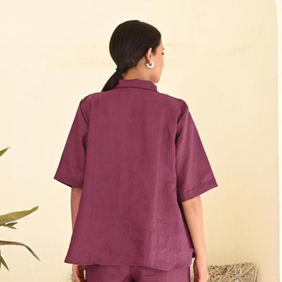 Oversized Linen Shirt, Long Sleeve: back view of woman in Garnet oversized linen shirt