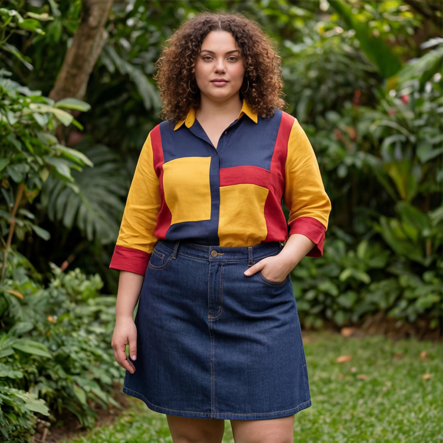 Red Blue Yellow Colorblock Linen Top: woman with curly hair in red, yellow and navy top and denim skirt