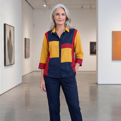 Red Blue Yellow Colorblock Linen Top: woman with grey hair in red, yellow and navy top and jeans, gallery