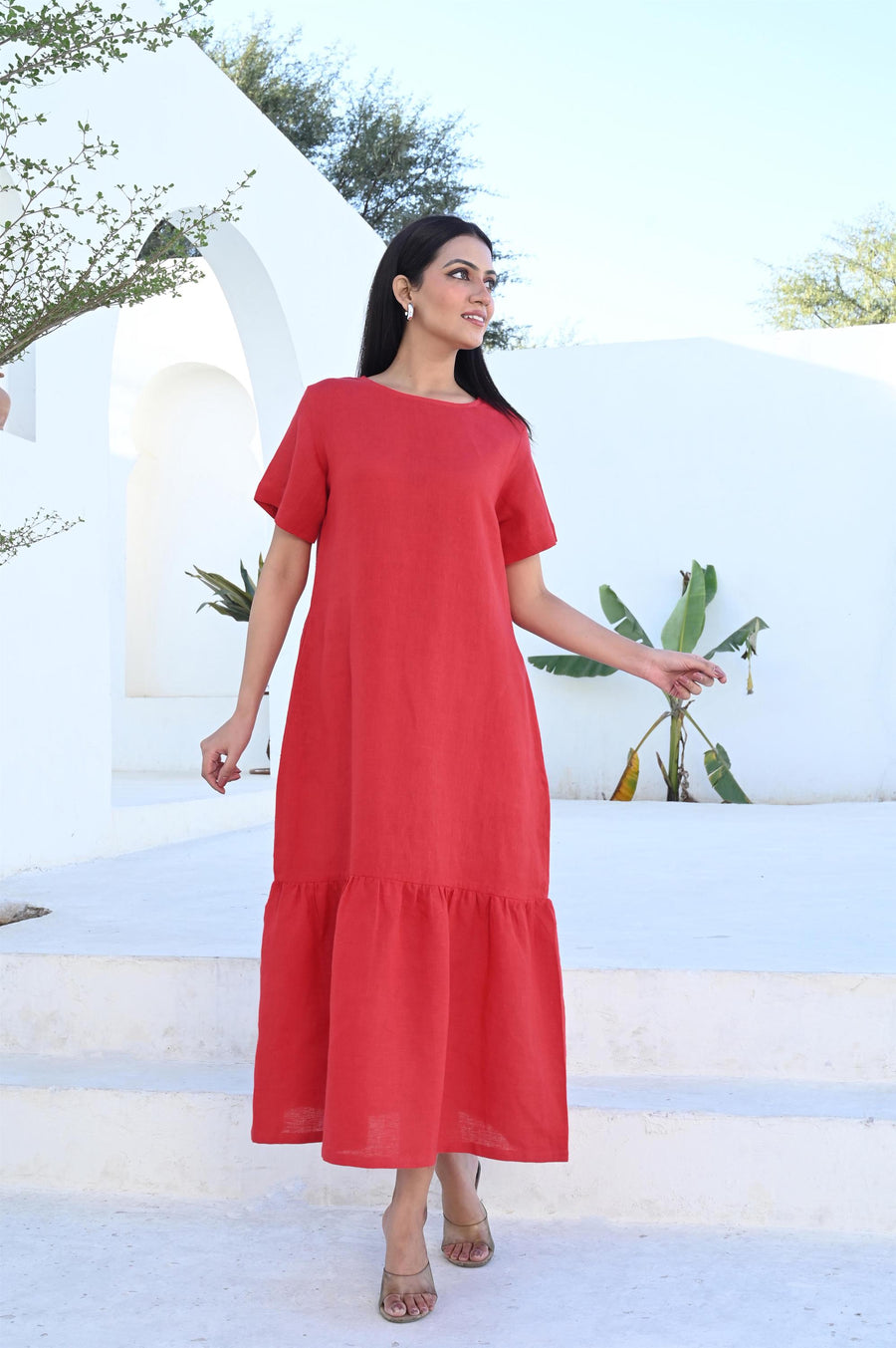 Red Linen Midi Dress, Gathered Hemline: woman in Blood Red linen midi dress walking with arm out, three quarter view