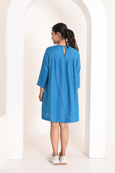 Relaxed Fit Linen Mini Dress, Gathered Yoke: back view of Topaz Blue linen mini dress with keyhole button at the neck