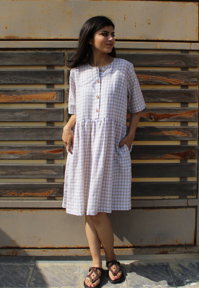 Smocked Linen Midi Dress, Short Sleeve: woman in lilac and white gingham linen midi dress with short sleeves, front view