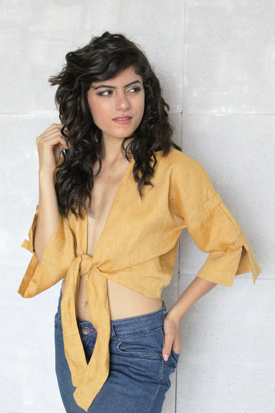 Tie Front Linen Top, Retro Style: close-up of Honey tie front top, hand in wavy hair