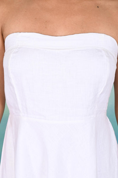 White Strapless Linen Midi Dress: close-up of structured bodice and waist seam on White strapless linen dress