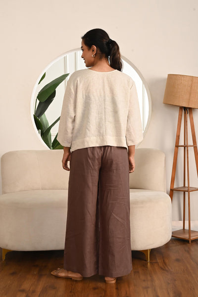 Wide Leg Linen Maxi Trousers: back view of woman in Burnt Wood wide leg linen trousers